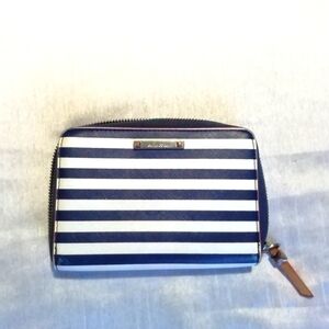 Stella and Dot clutch, navy blue and white stripe, zip around.